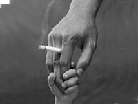 manos-adult-nino-tabaco.jpg